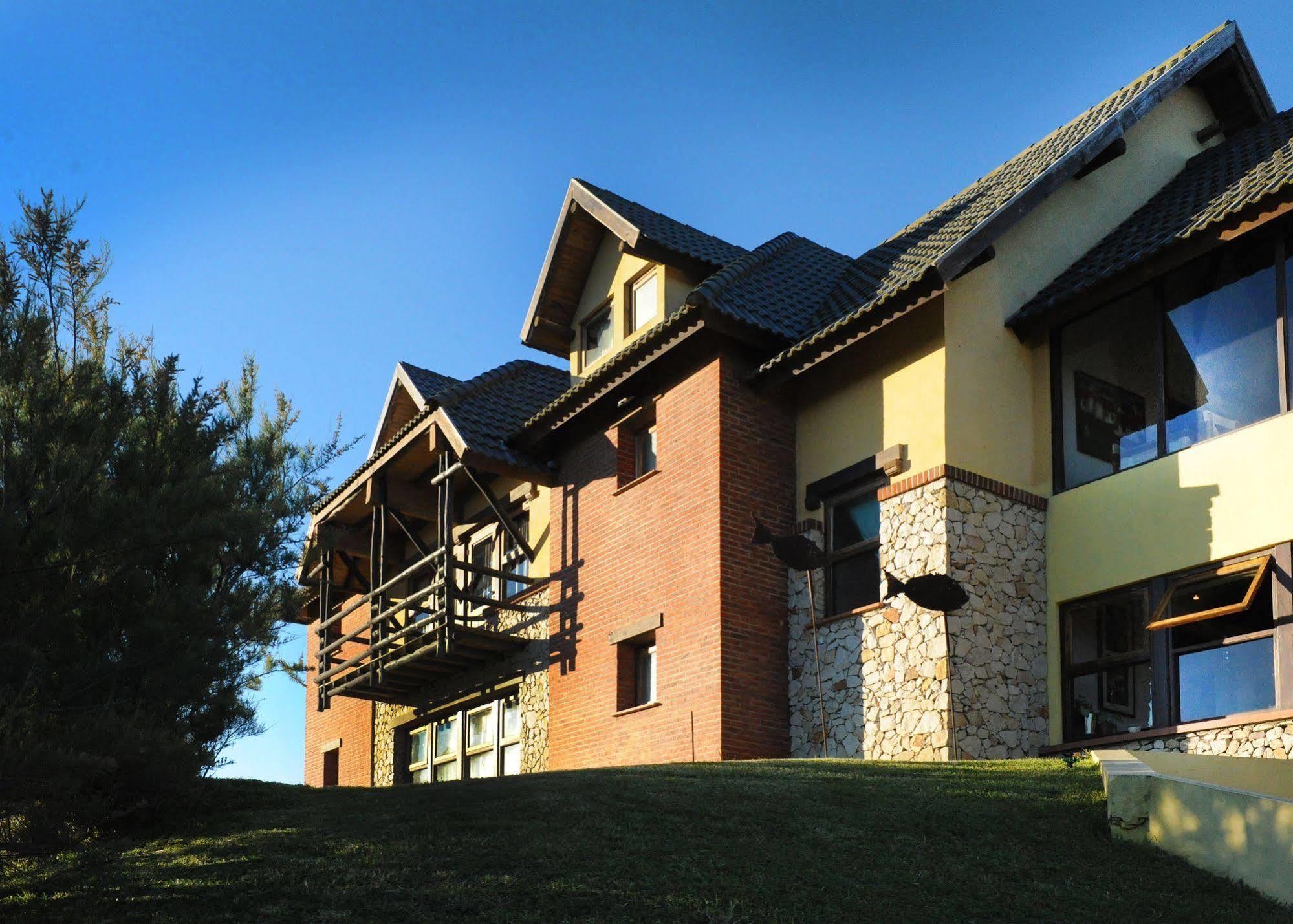 Hotel Boutique Arenarena Villa Gesell Bagian luar foto